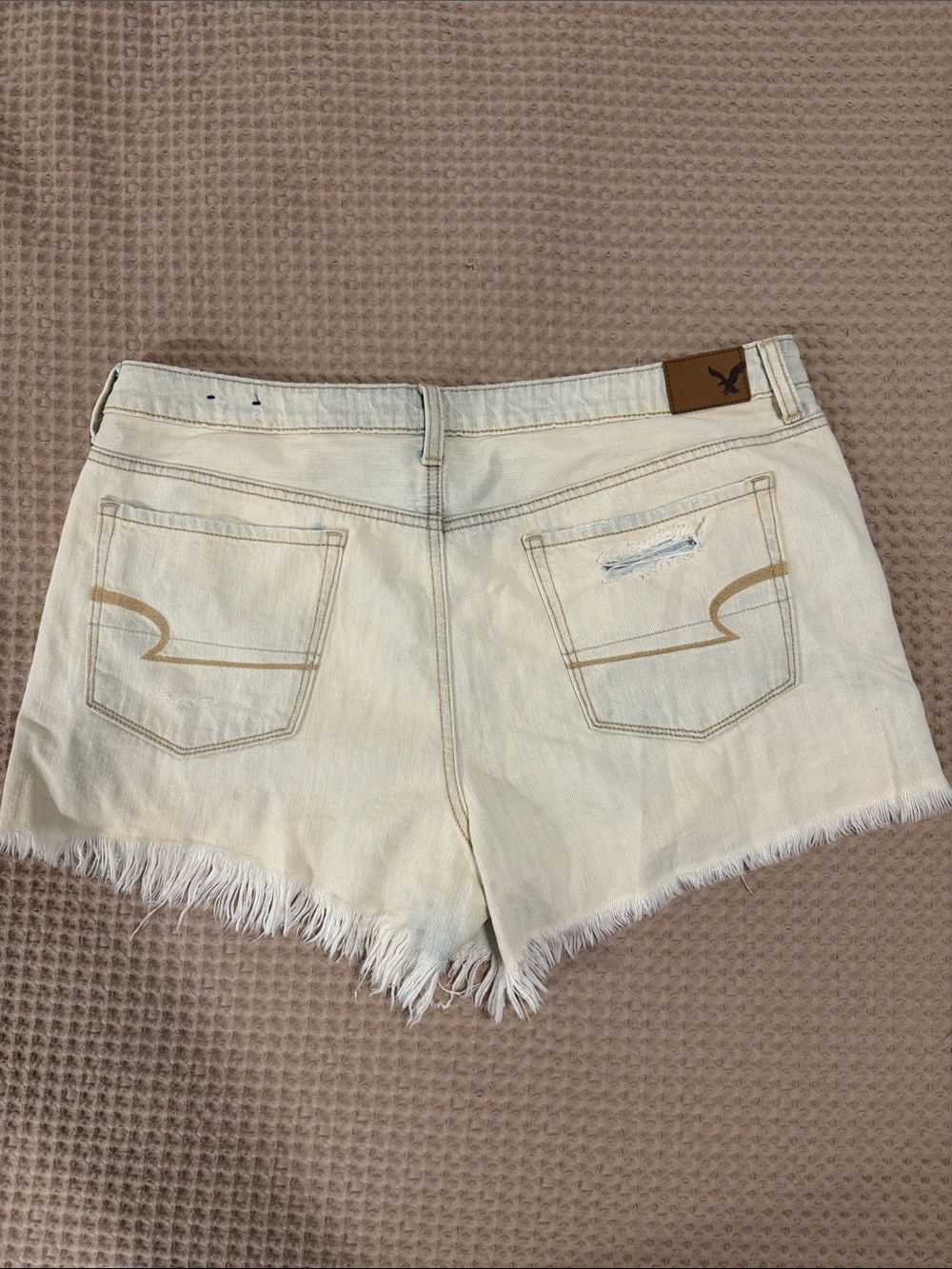 American Eagle Outfitters Cream Frayed Denim Cutoff Shorts